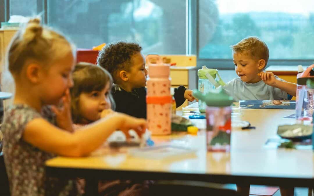 Children eating lunch in a classroom at the Early Learning Center